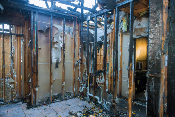 Professional Fire Damage Restoration technician working in Mather, CA